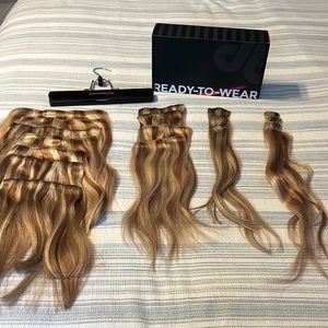 Clip in human hair extensions